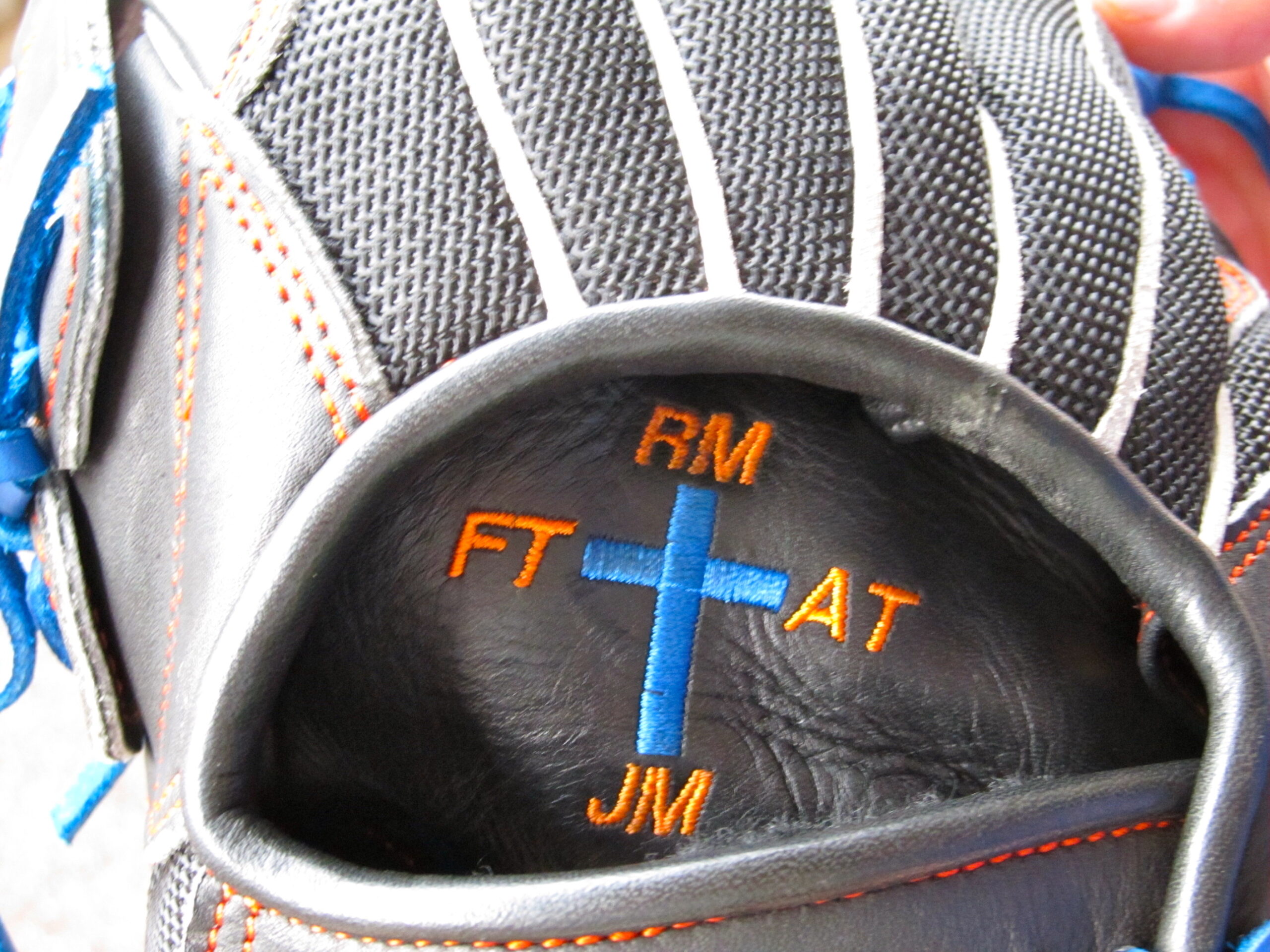 The cross on John Mincone's glove (Photo by Jim Mancari)