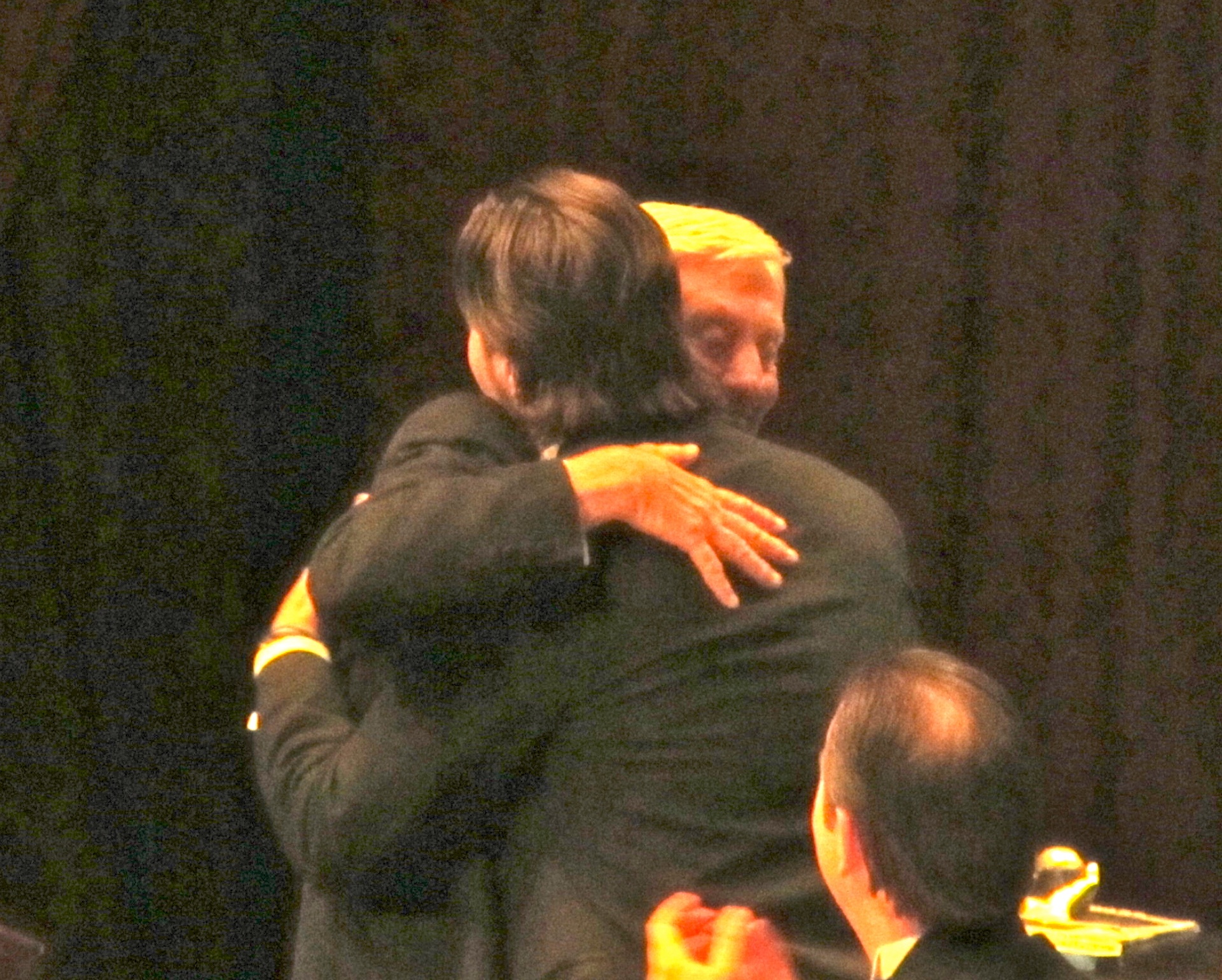 Phil Niekro and R.A. Dickey embrace.