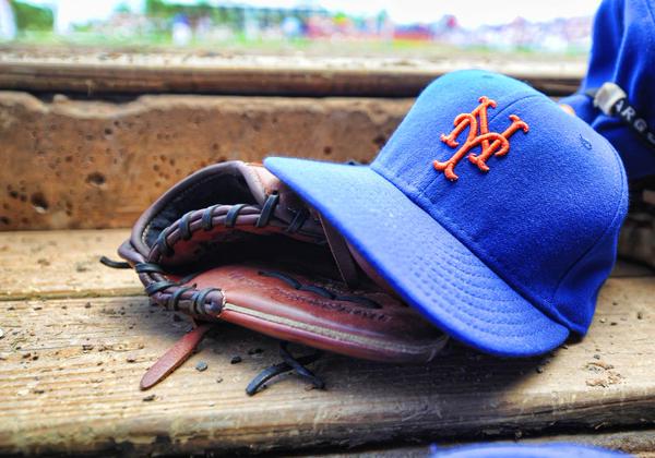 mets cap hat glove bench