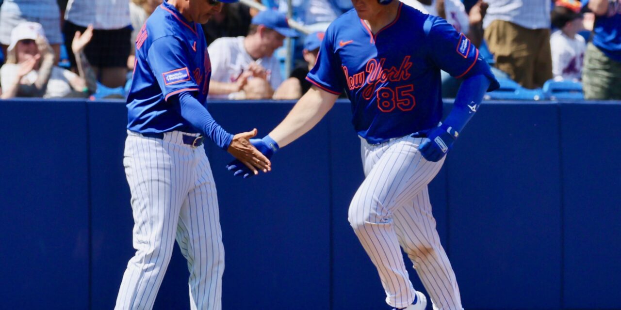 Holmes, Reetz Power Mets Past Nationals