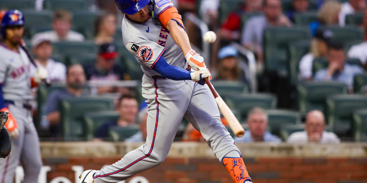 Tyrone Taylor Shows Off Bat and Glove